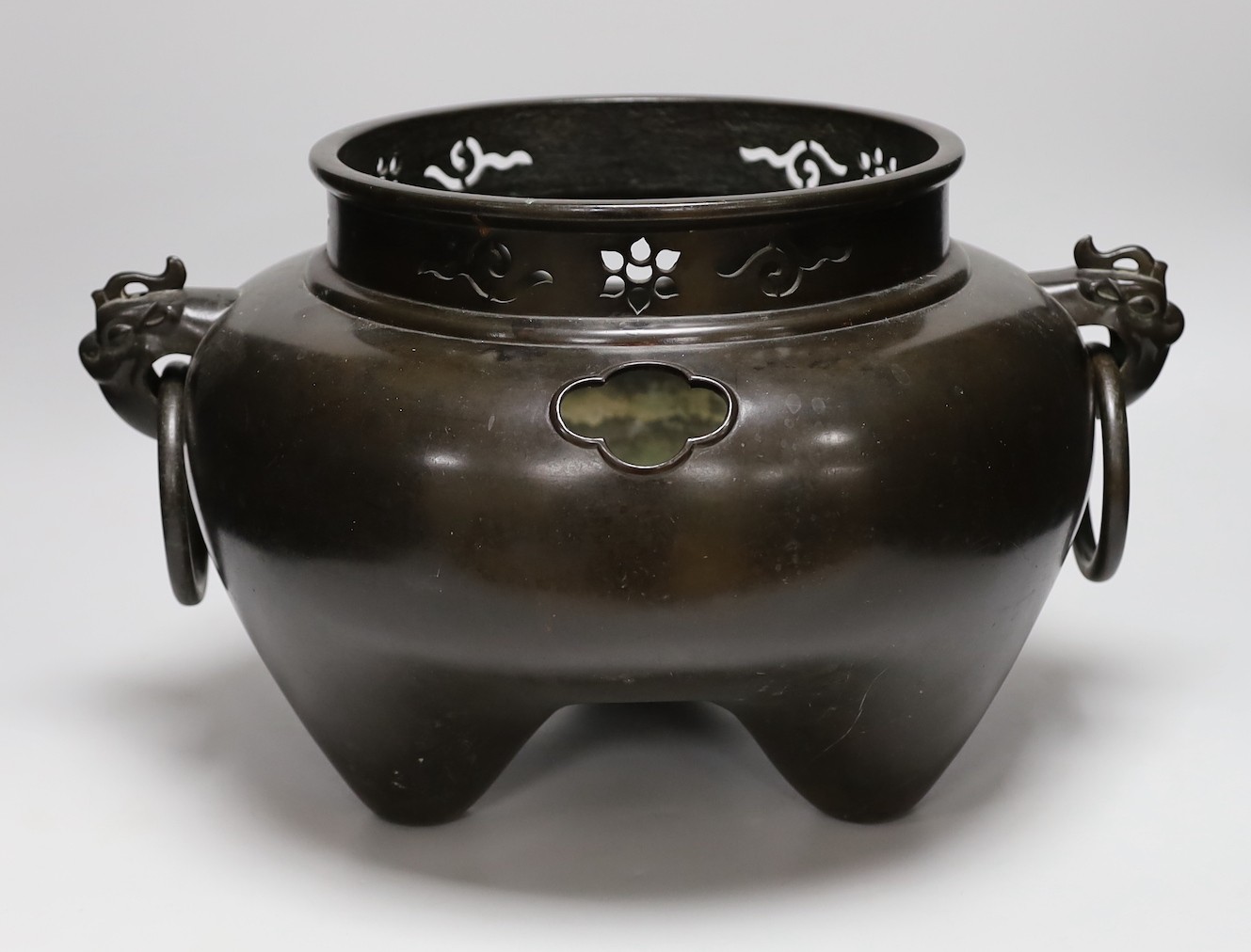 A Japanese bronze tripod jardinière, Meiji period, 26cms high
